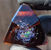 Load image into Gallery viewer, amber glass triangle pendant with blue metatrons cube