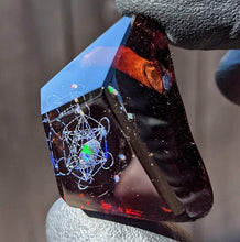 Load image into Gallery viewer, amber glass triangle pendant with blue metatrons cube