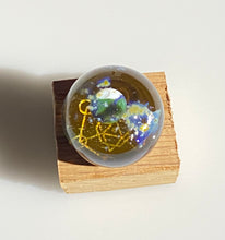 Load image into Gallery viewer, earthly planet with sacred geometry marble