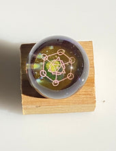 Load image into Gallery viewer, earthly planet with sacred geometry marble