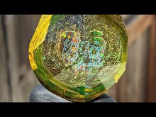 Load and play video in Gallery viewer, fully faceted UV glass with skull opal and sacred geometries pendant