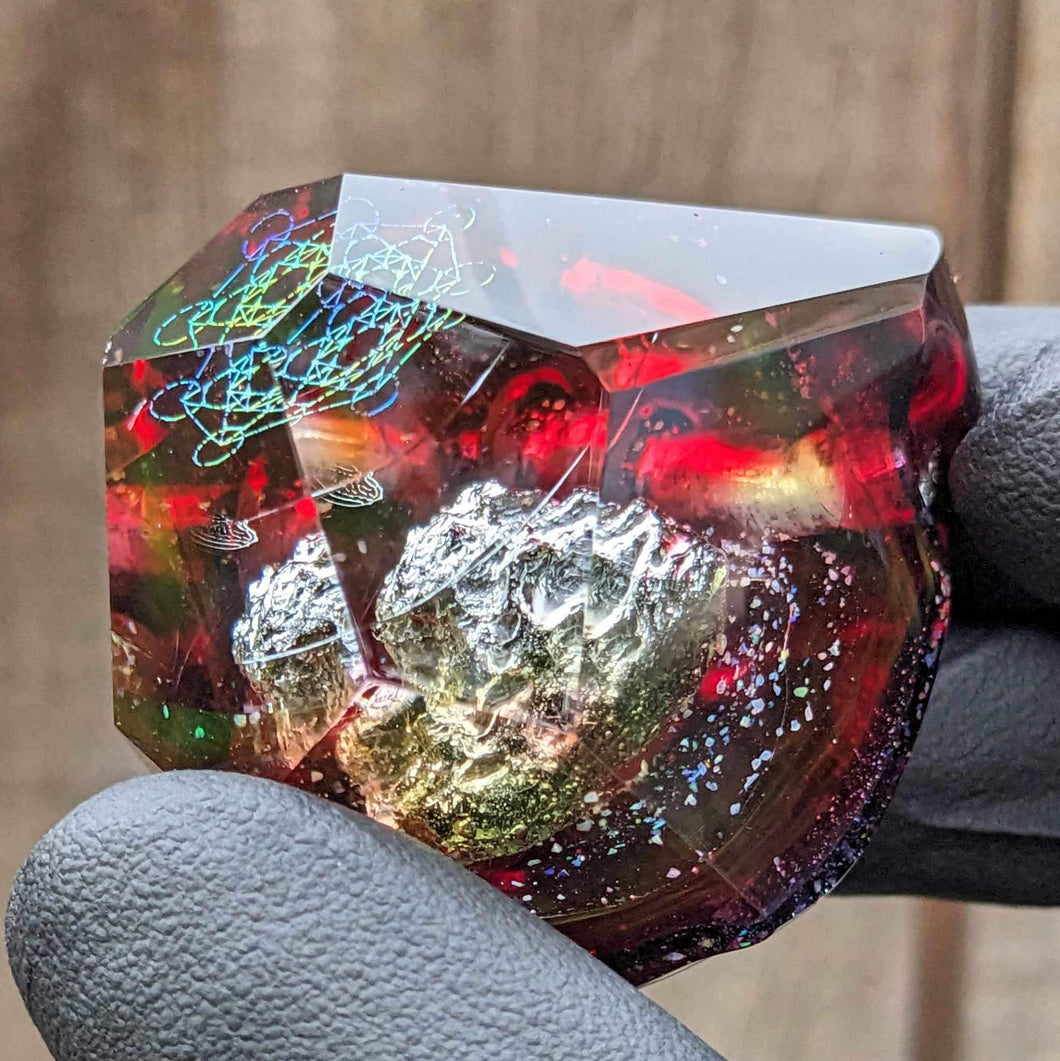 moldivite meteorite with sacred geometry and opal inlay faceted pendant