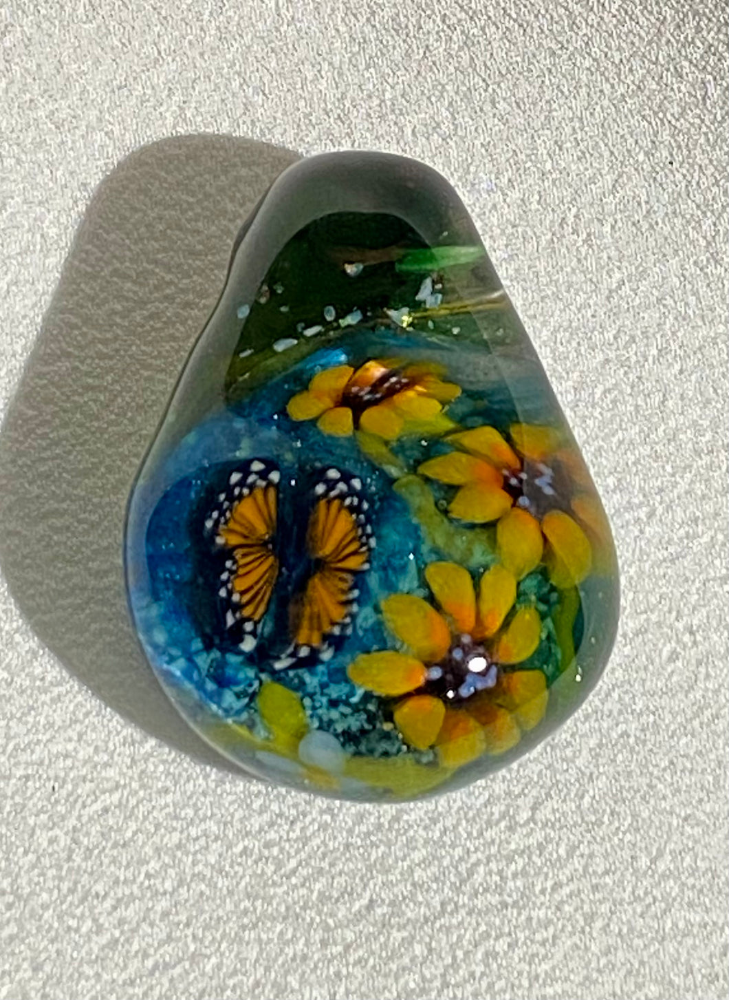 monarch butterfly with flowers pendant