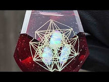 Load and play video in Gallery viewer, red glass geometrical pattern faceted pendant
