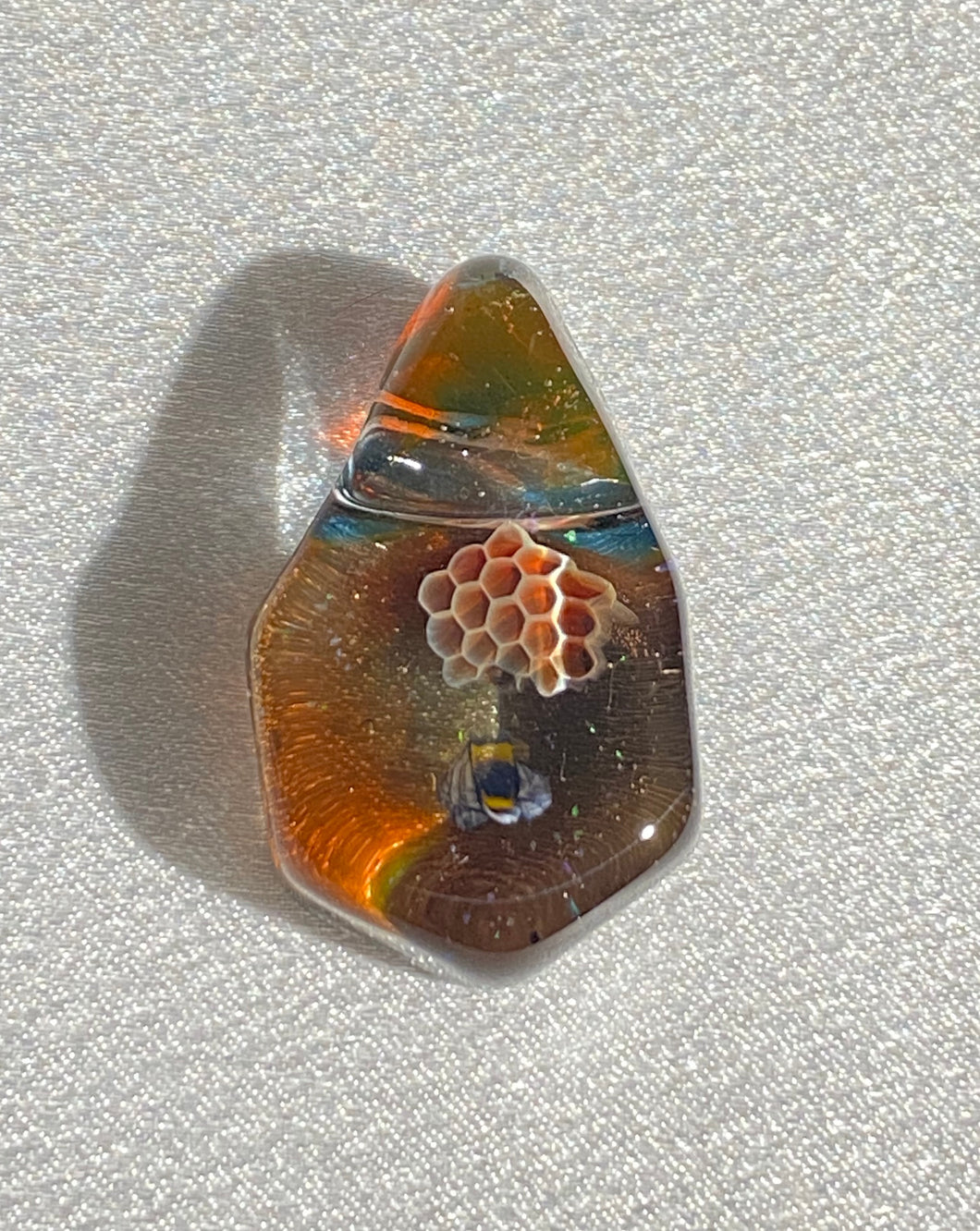 honey bee with honeycomb pendant