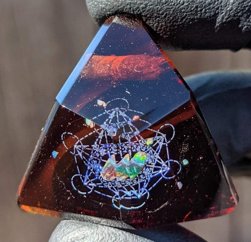 amber glass triangle pendant with blue metatrons cube