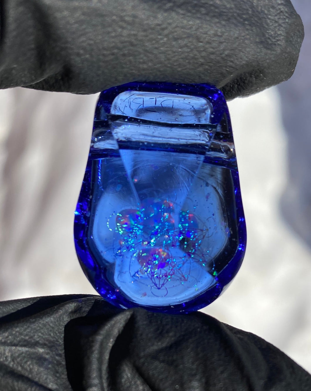 metatrons cube encased in blue glass pendant